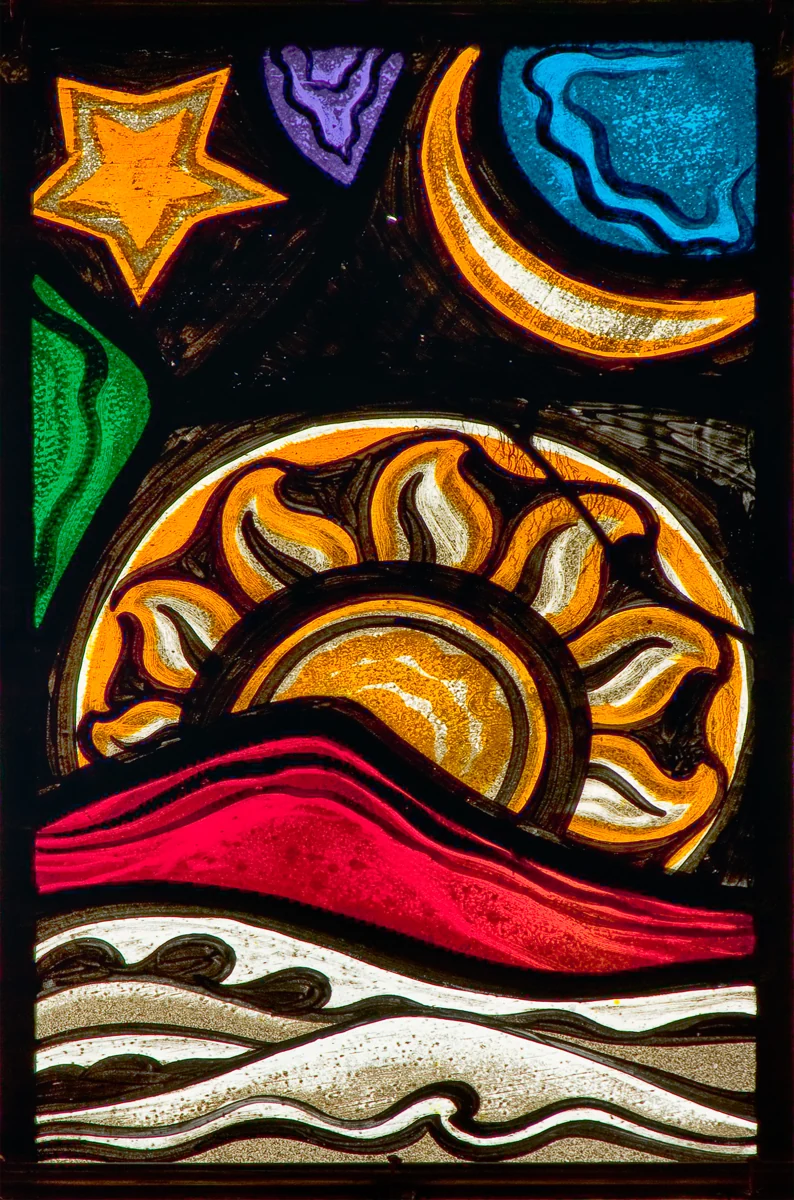 Original stained-glass photograph with a yellow star, sun and colored flowing bands